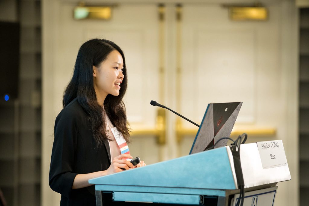 Shirley Ren presents her works at the conference.